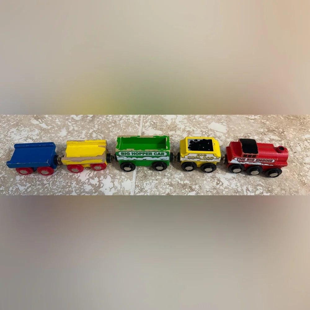5 wooden train cars (including engine) compatible with Brio and Thomas.
